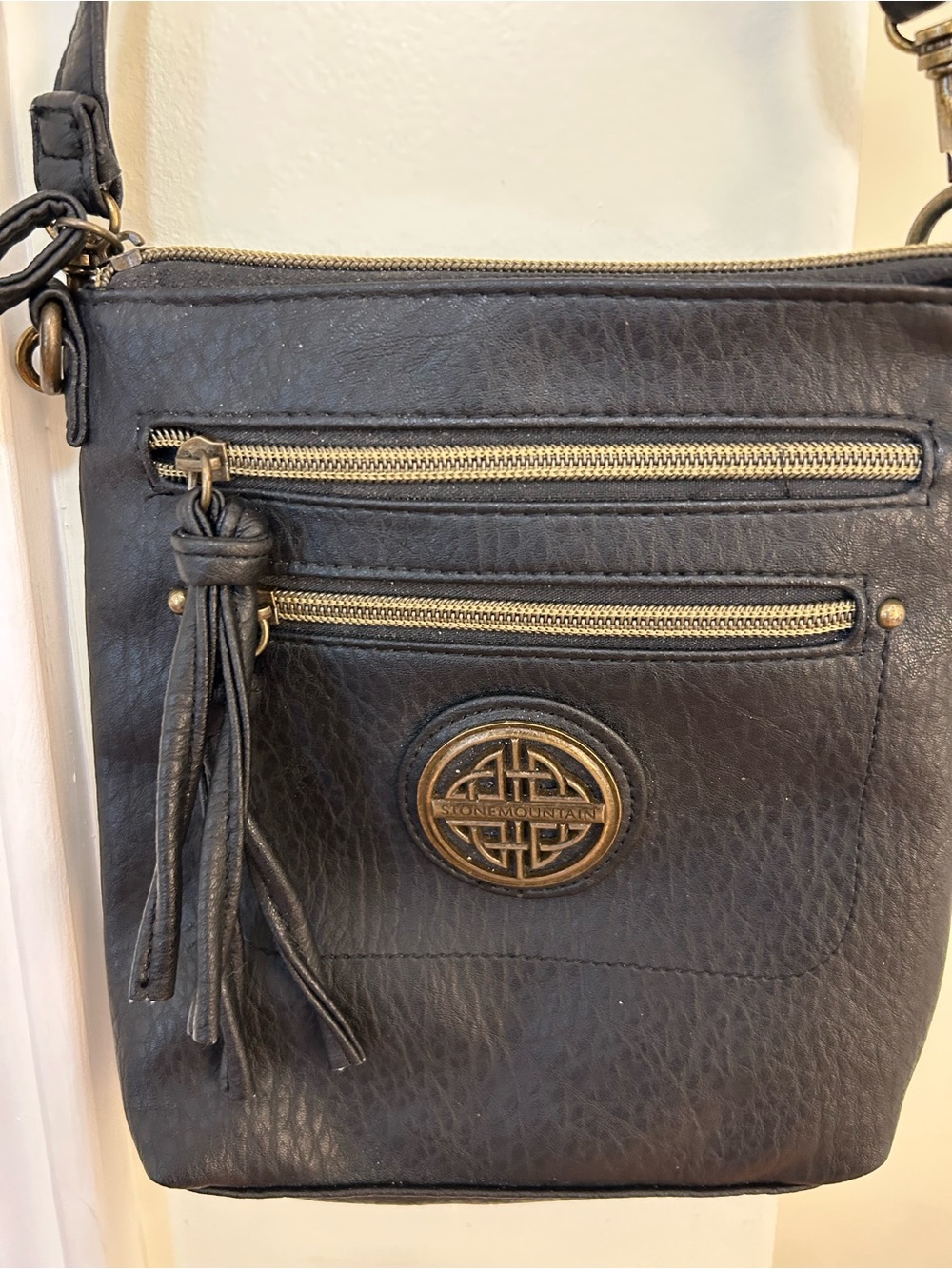 Stone Mountain Accessories Black Crossbody Bag with Tassel Accent
